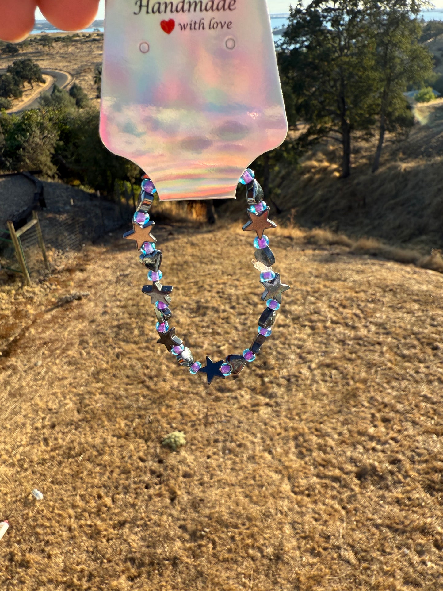 Hematite stars and purple glass beads